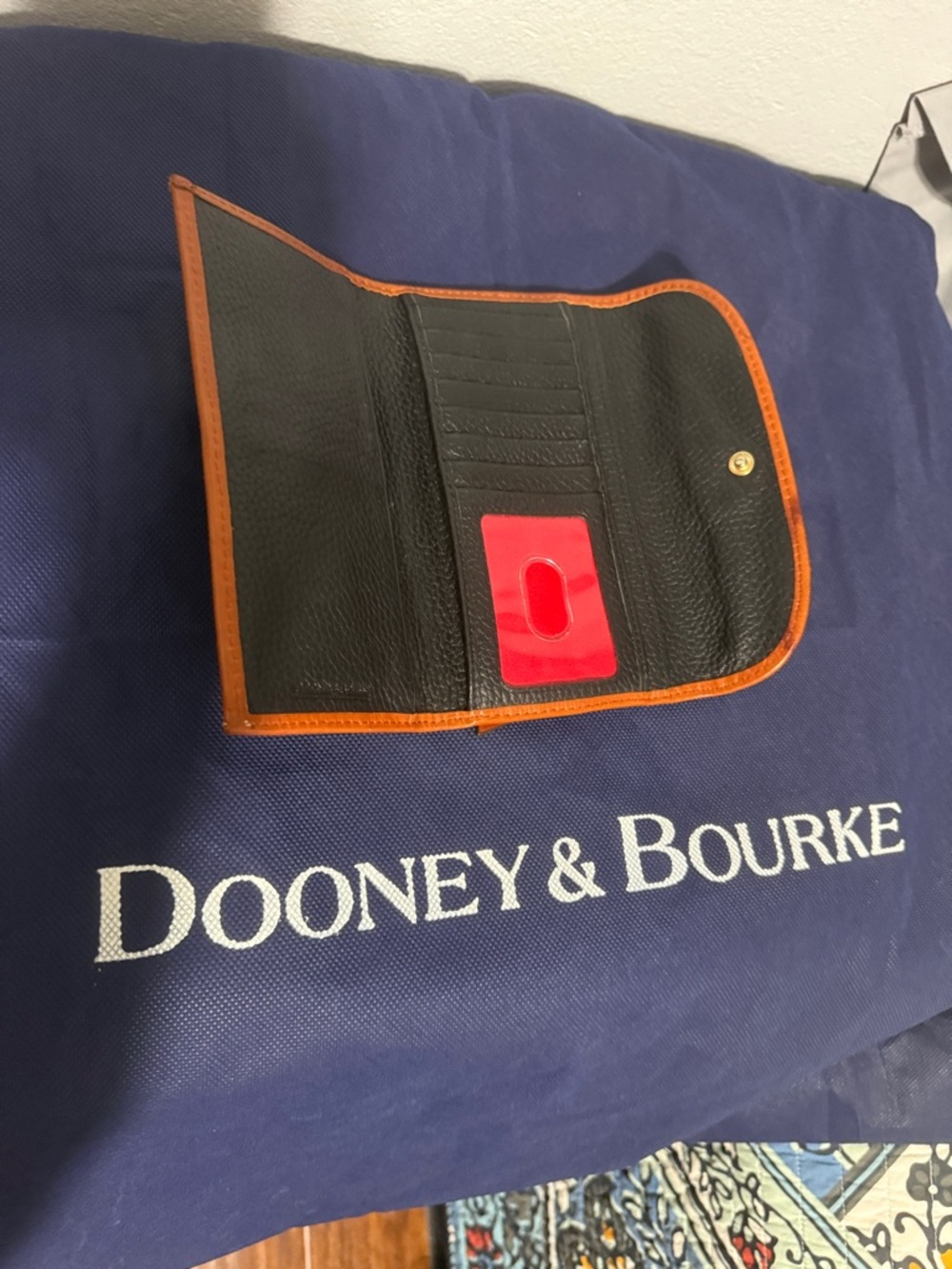 Dooney & Bourke Black Leather Trifold Wallet with Brown Trim